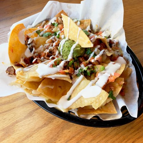 nachos on oval tray
